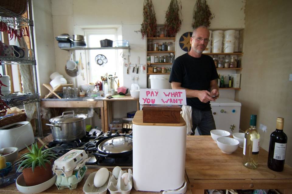 Bruce Darrell preparing one of his pay-what-you-want feasts, a multi course meal sourced form his RED (research Education Demonstration) gardens